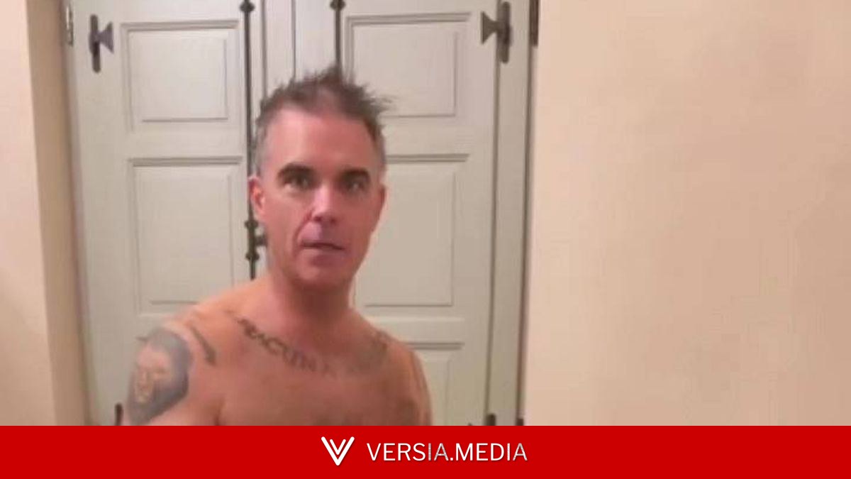 Robbie Williams strips to underwear as England win first World Cup game
