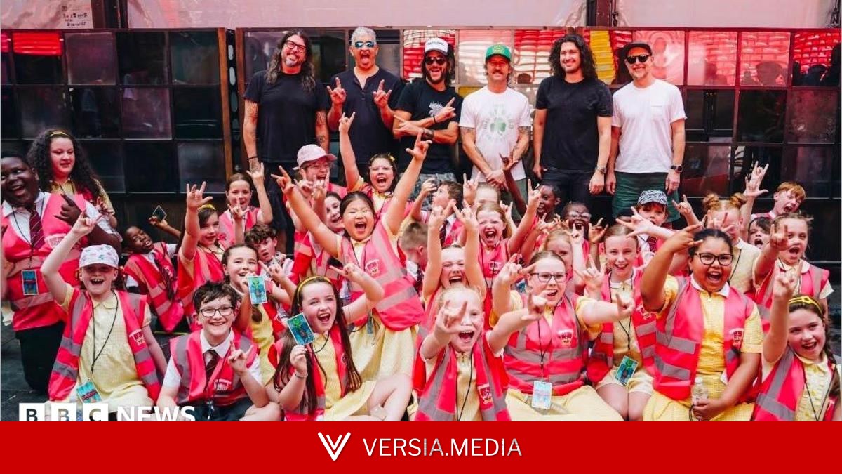 Pupils perform for Foo Fighters in stadium show