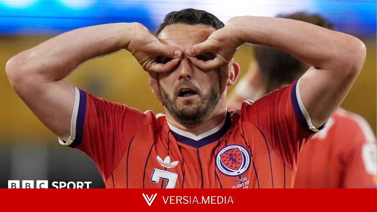 Why does Scotland's McGinn celebrate with goggles?